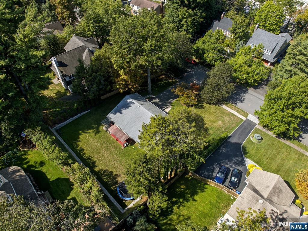 40 Magnolia Avenue Tenafly, NJ 07670 - Photo 47 of 48 an aerial view of a house with a yard