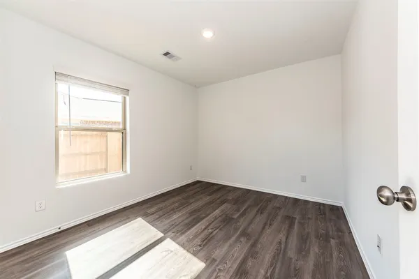 an empty room with a window