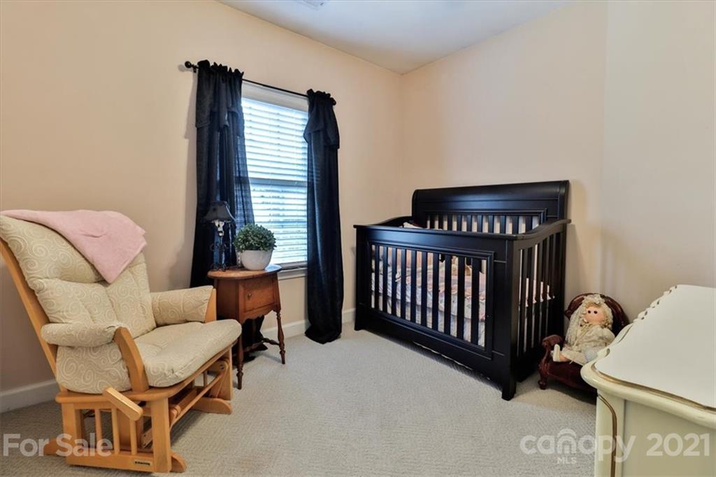 796 Portpatrick Place Fort Mill, SC 29708 - Photo 33 of 48 a bedroom with furniture and a window