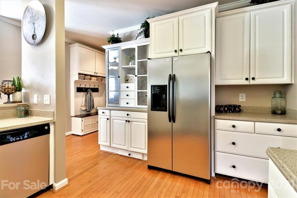 796 Portpatrick Place Fort Mill, SC 29708 - Photo 7 of 48 a kitchen with stainless steel appliances a refrigerator sink and cabinets
