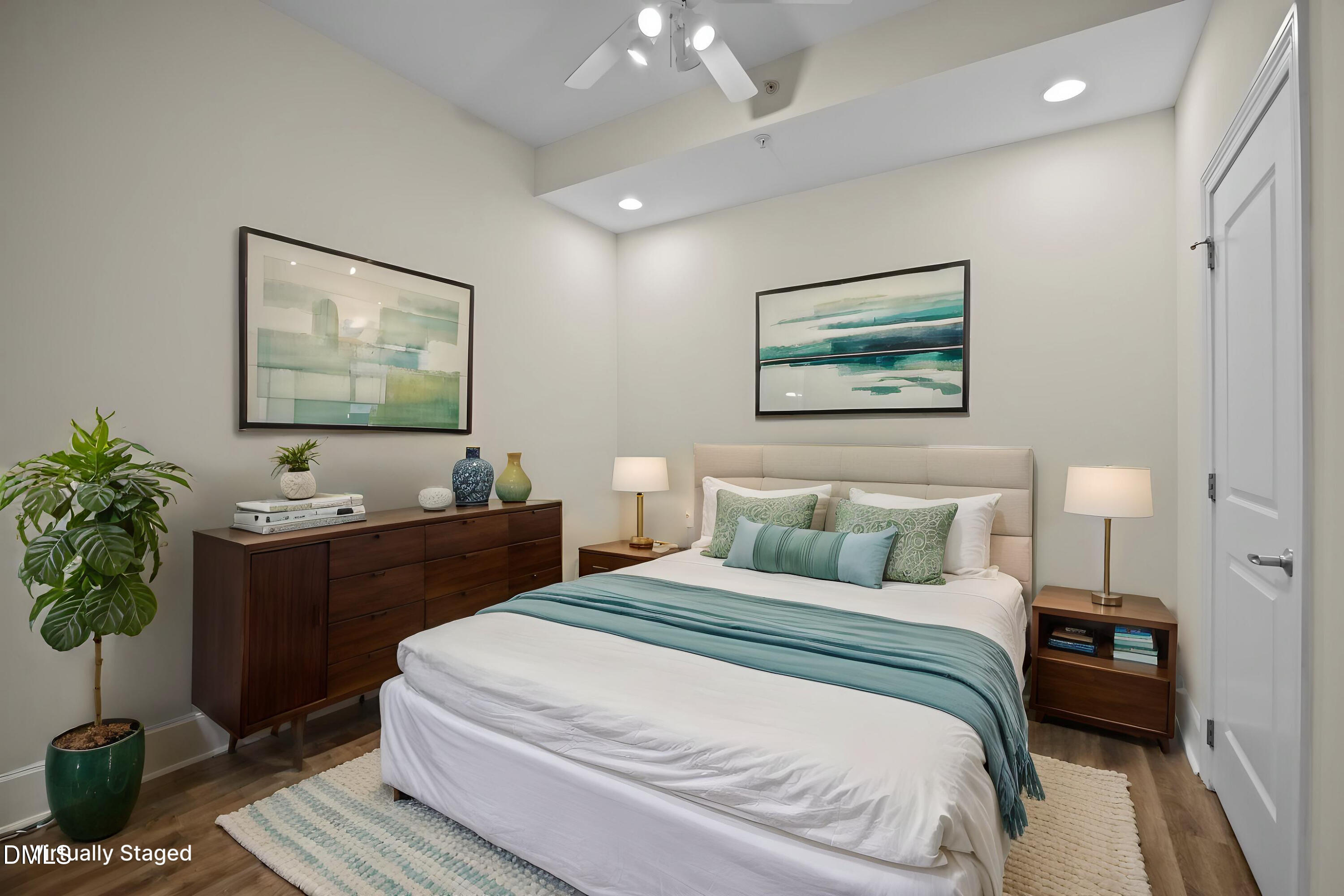 400 West North Street, Unit 814 Raleigh, NC 27603 - Photo 19 of 41 a bedroom with bed and a chandelier