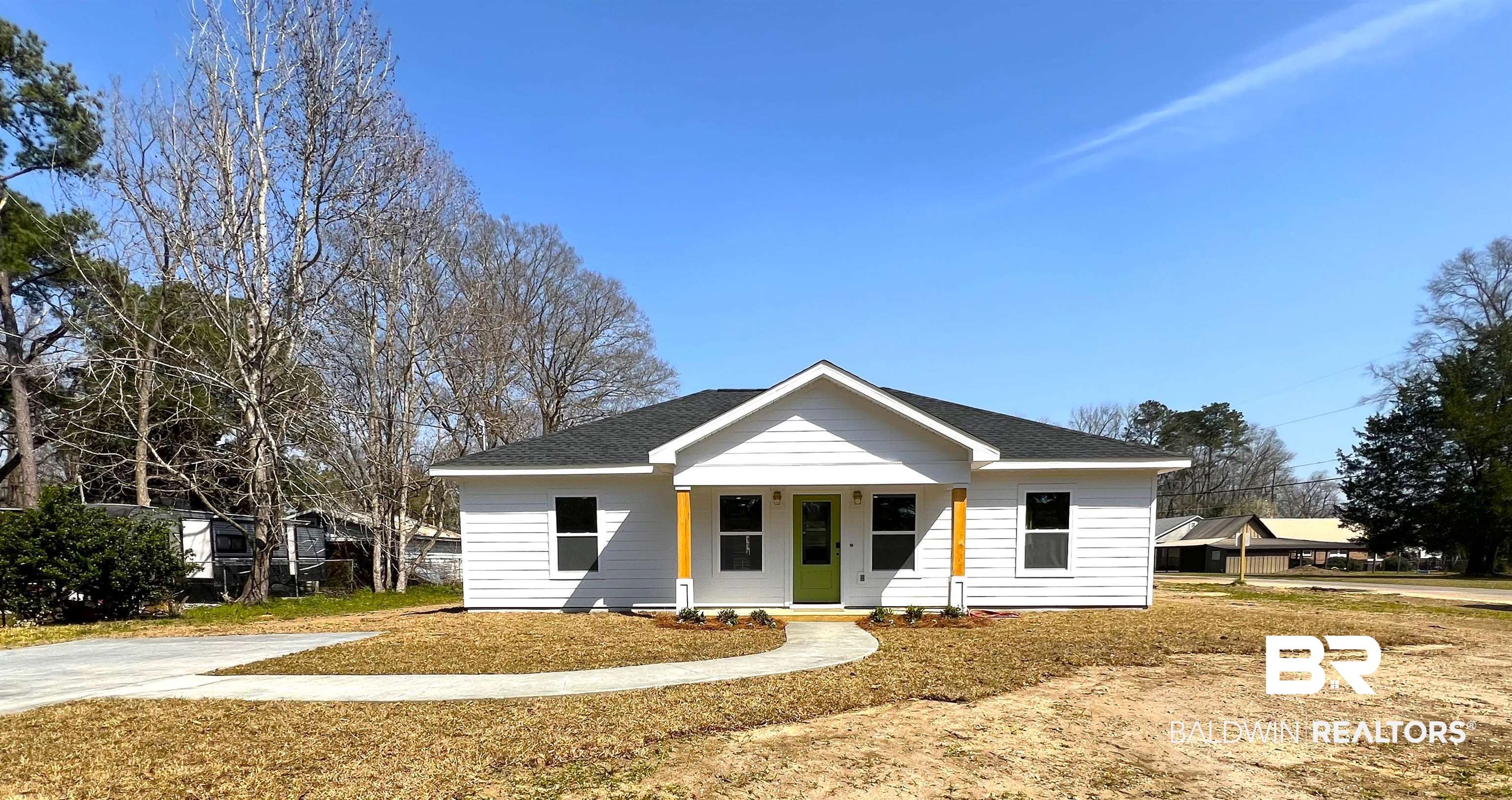 102 Earl Street Brewton, AL 36426 - Photo 17 of 27 View of front of house with covered porch and roof with shingles