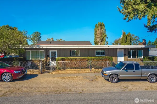 a car parked in front of a house