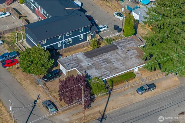 an aerial view of a house with a garden