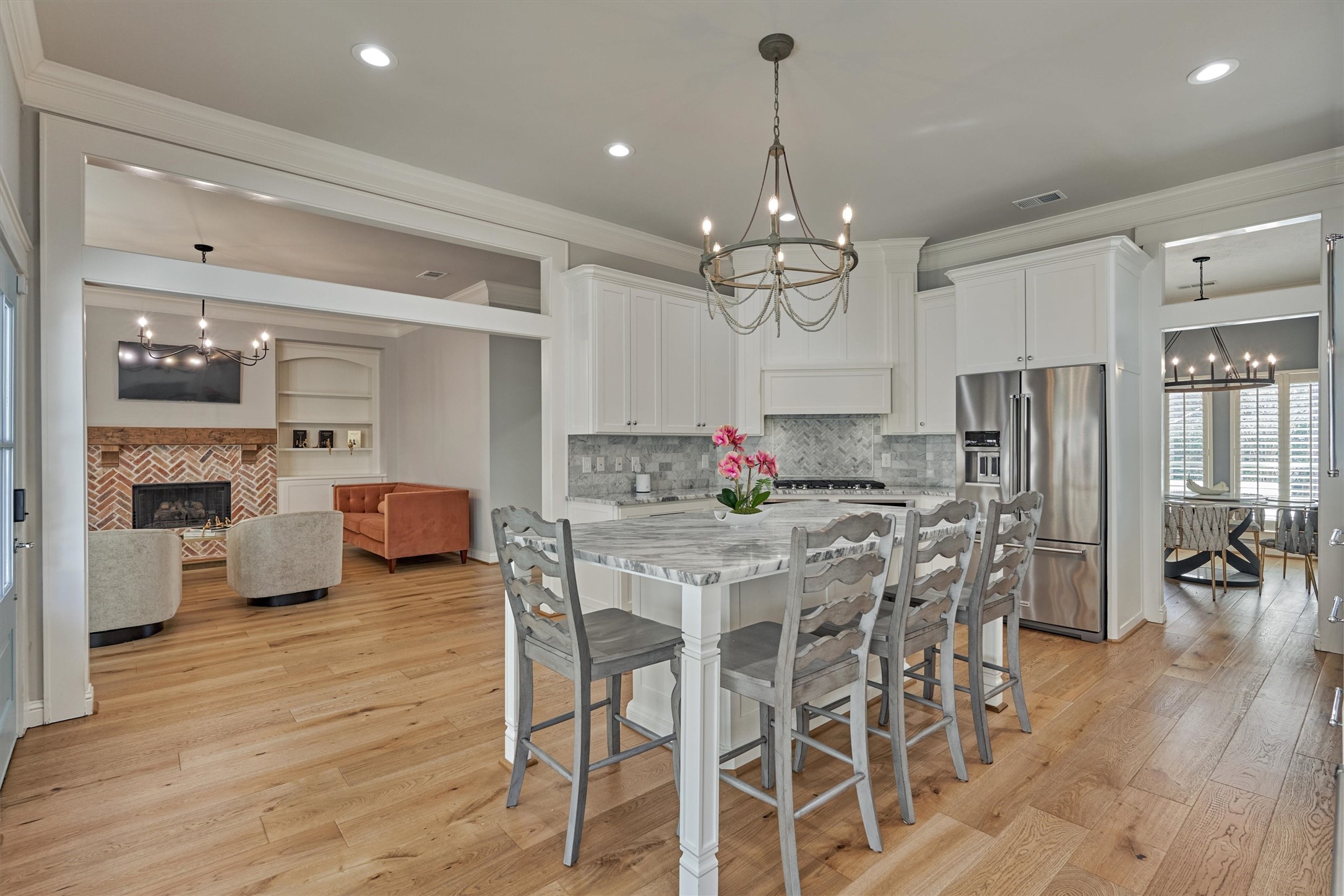 19 Pipers Meadow Street Spring, TX 77382 - Photo 48 of 50 a view of a dining room with furniture and wooden floor