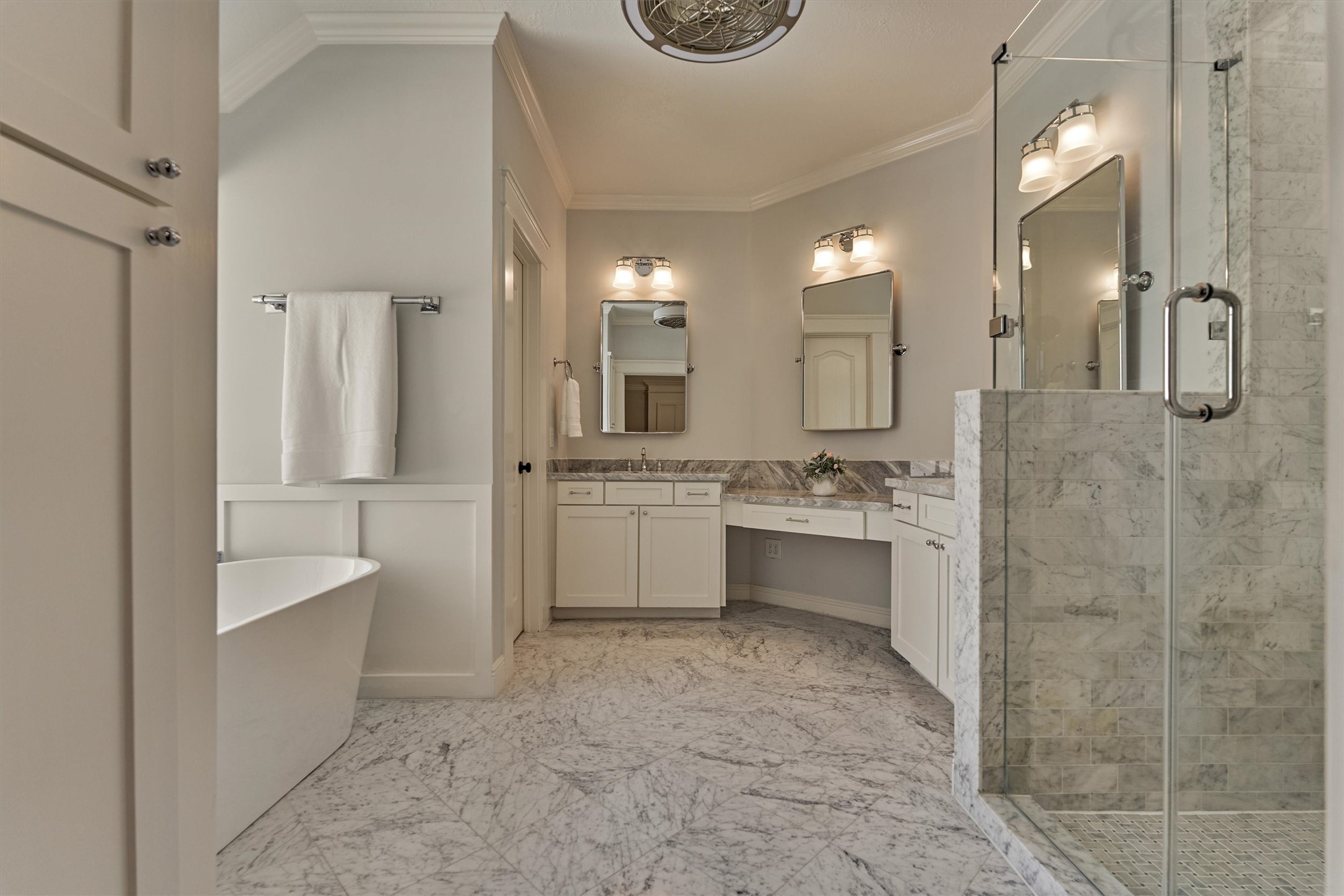 19 Pipers Meadow Street Spring, TX 77382 - Photo 20 of 50 a bathroom with a double vanity sink a toilet a mirror and shower
