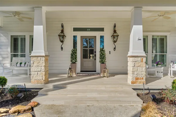 a front view of a house with a outdoor space