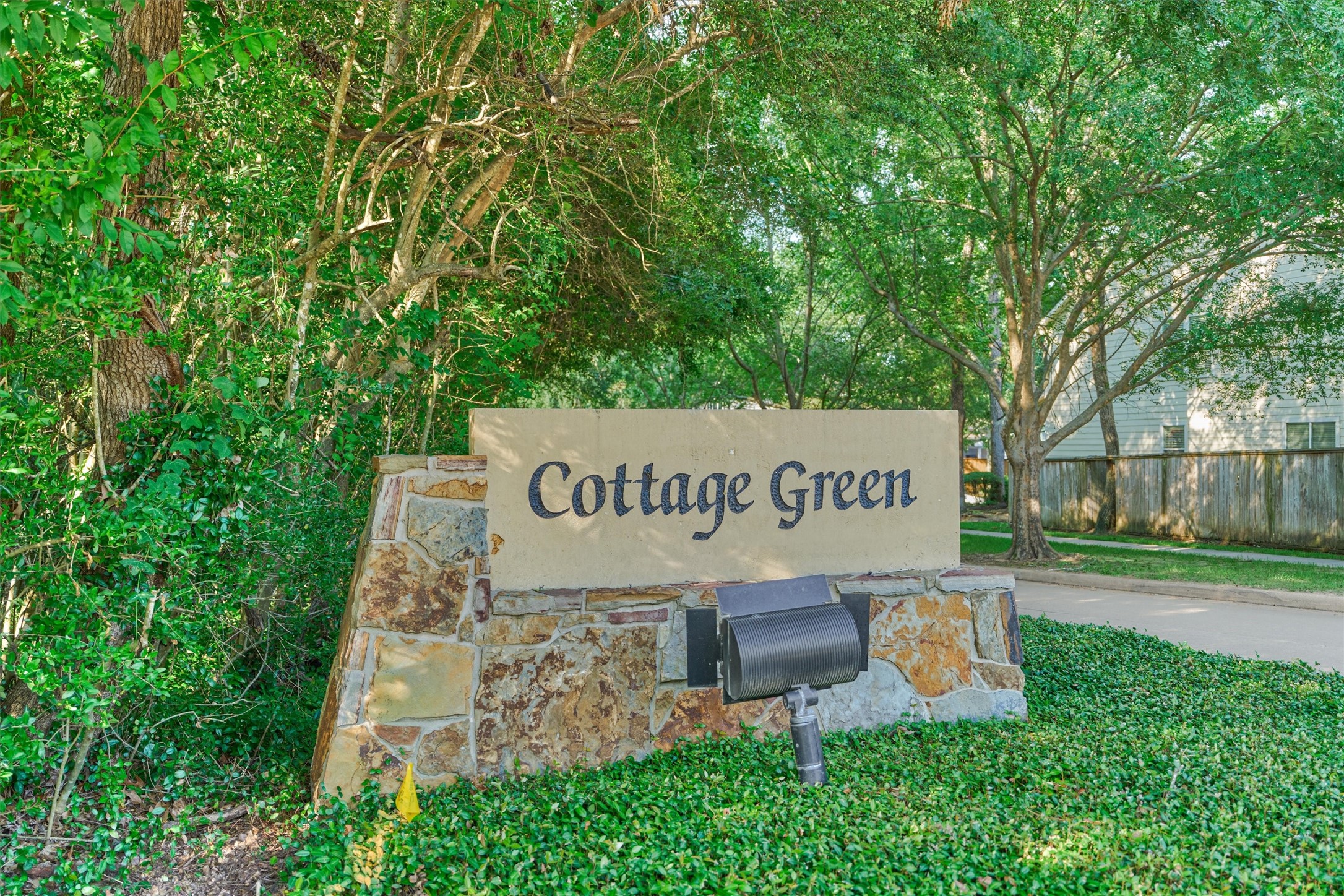 19 Pipers Meadow Street Spring, TX 77382 - Photo 41 of 50 a sign that is sitting in front of a tree