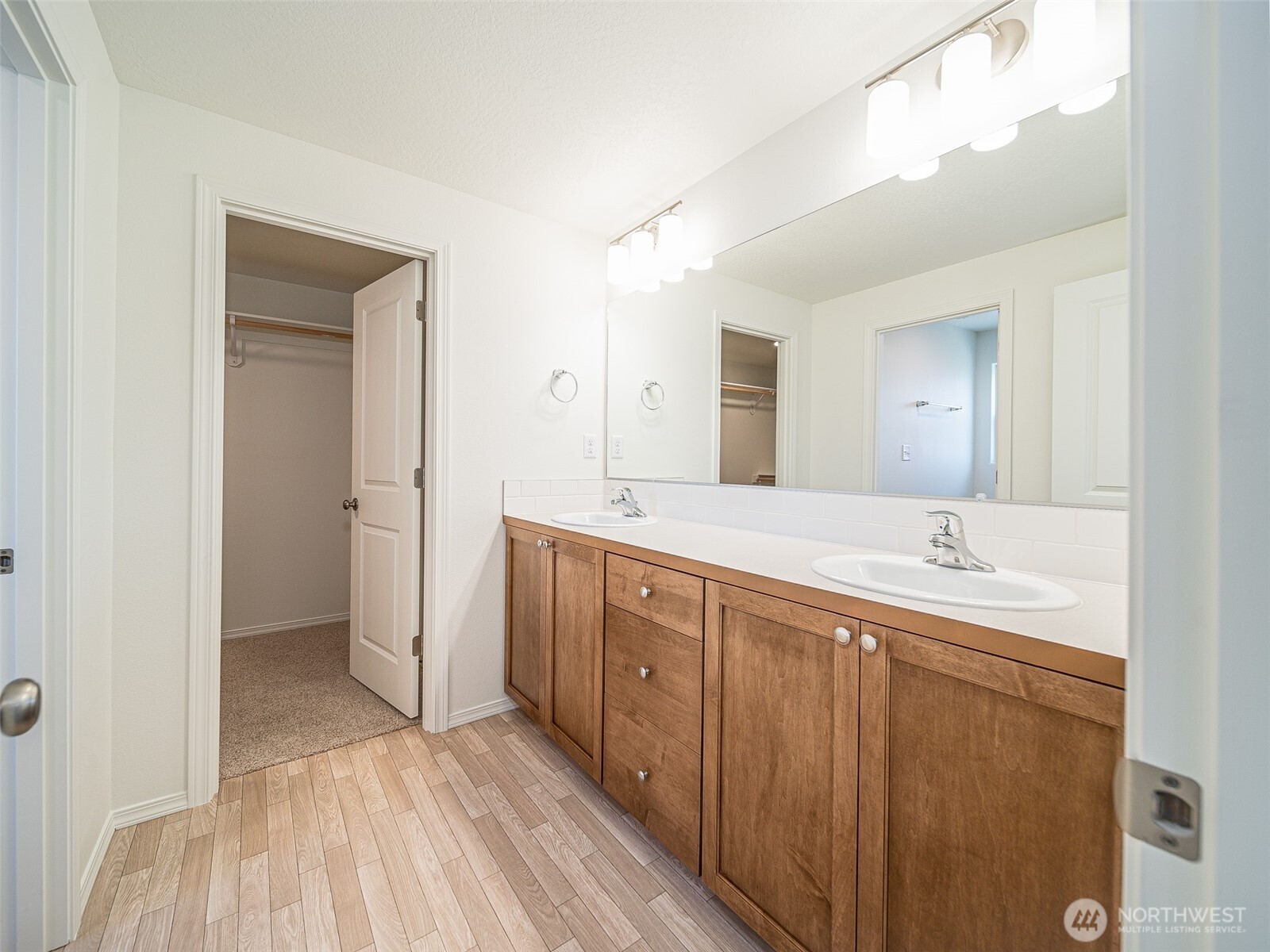 1902 Hickory Road Moses Lake, WA 98837 - Photo 9 of 9 a spacious bathroom with a double vanity sink and a mirror