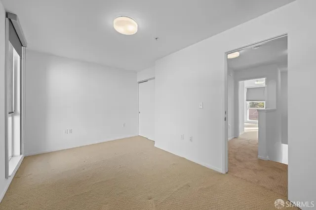 a bathroom with a granite countertop sink and vanity