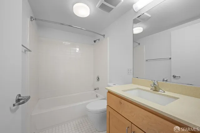 a view of a patio with couches and a fire pit