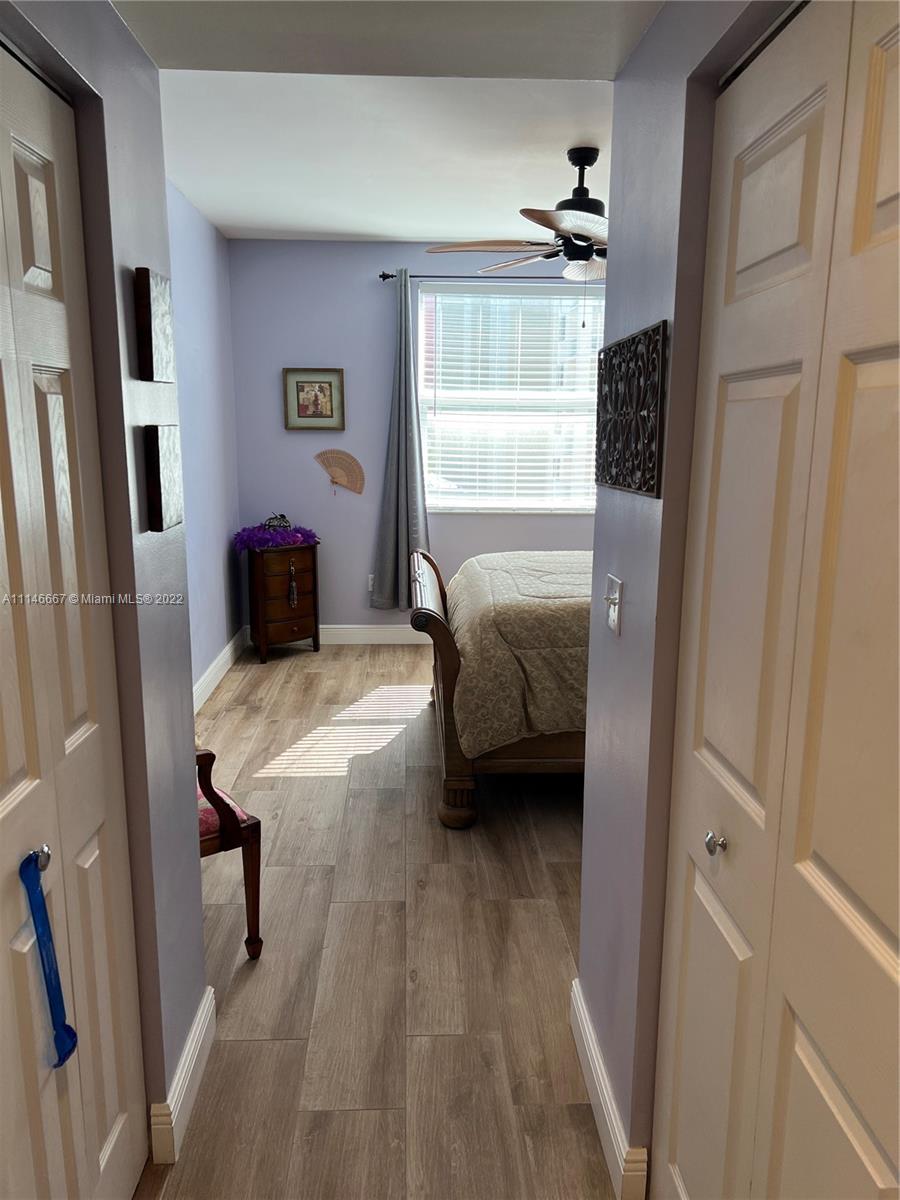 17100 North Bay Road, Unit 1701 Sunny Isles Beach, FL 33160 - Photo 40 of 84 a bedroom with a bed and a window