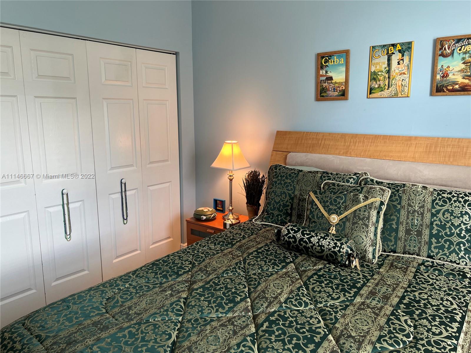 17100 North Bay Road, Unit 1701 Sunny Isles Beach, FL 33160 - Photo 54 of 84 a bed room with a bed and a window