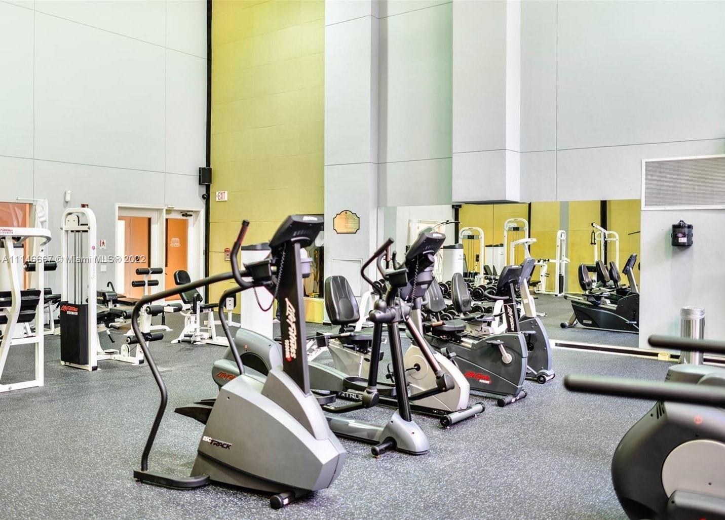 17100 North Bay Road, Unit 1701 Sunny Isles Beach, FL 33160 - Photo 63 of 84 a view of a room with gym equipment