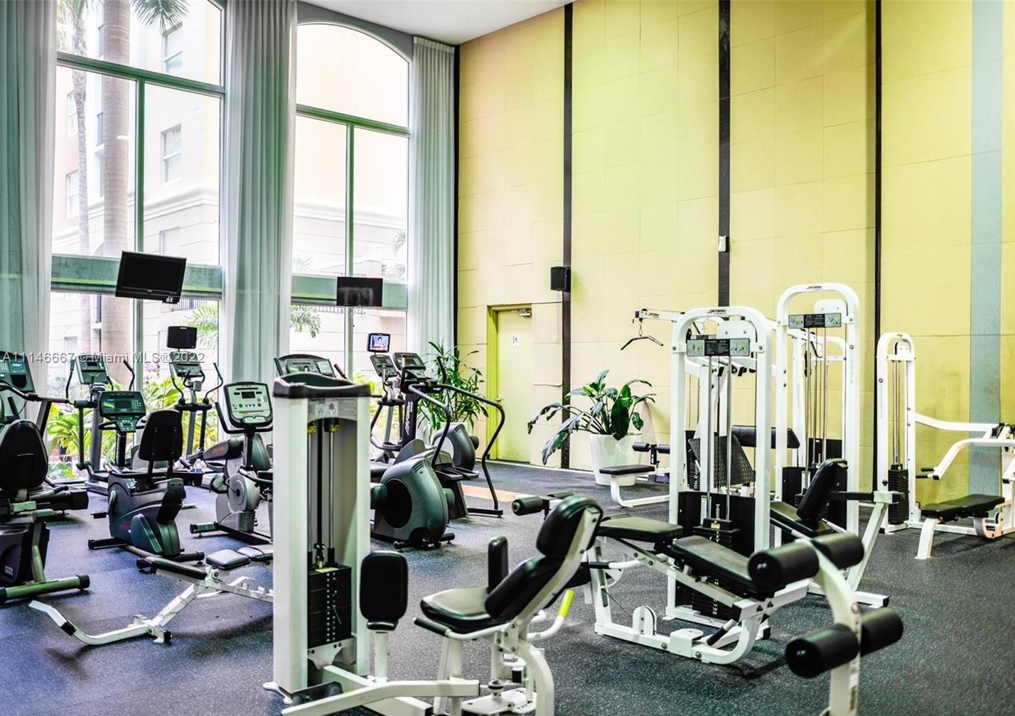 17100 North Bay Road, Unit 1701 Sunny Isles Beach, FL 33160 - Photo 64 of 84 a view of a room with gym equipment