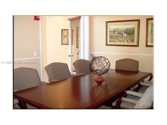 17100 North Bay Road, Unit 1701 Sunny Isles Beach, FL 33160 - Photo 71 of 84 a living room with furniture and a white wall