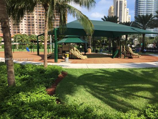 17100 North Bay Road, Unit 1701 Sunny Isles Beach, FL 33160 - Photo 81 of 84 a view of a chairs and tables in patio