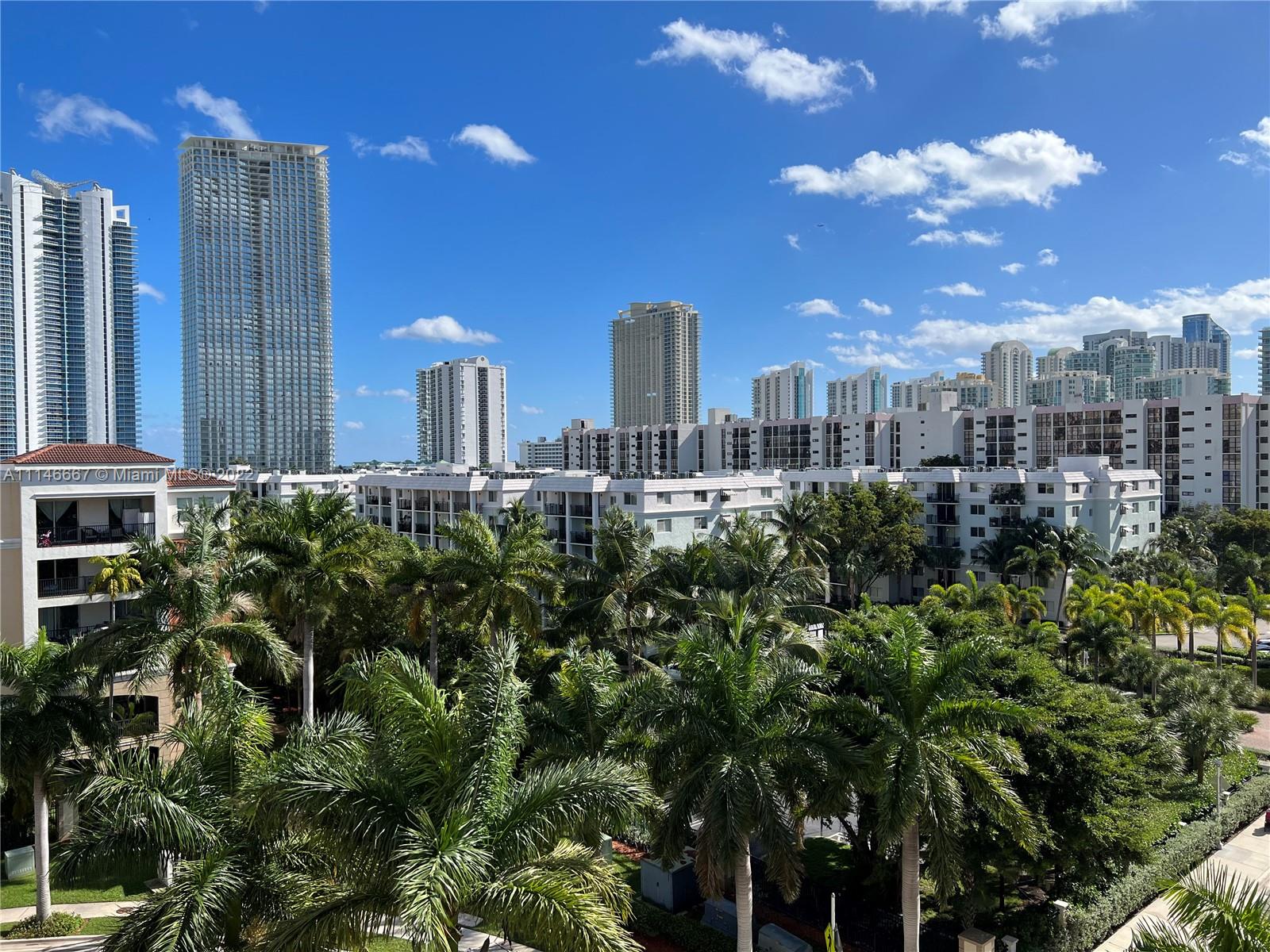 17100 North Bay Road, Unit 1701 Sunny Isles Beach, FL 33160 - Photo 9 of 84 a view of a city with tall buildings