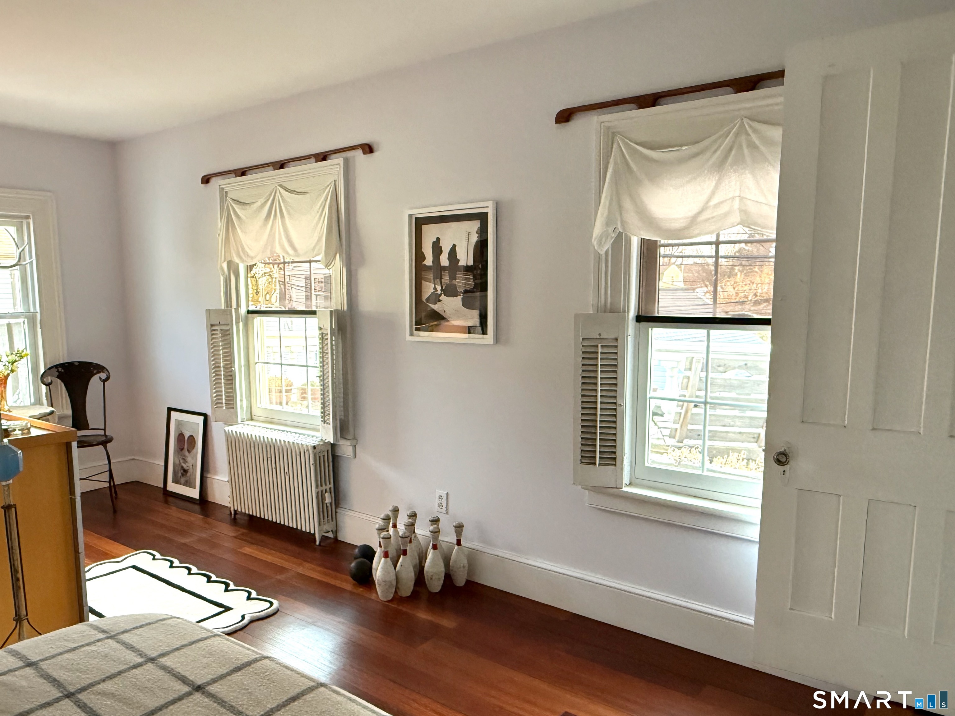 137 Water Street, Unit 2 Stonington, CT 06378 - Photo 6 of 18 a living room with furniture and a window