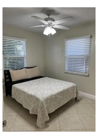 a view of a livingroom with furniture and window
