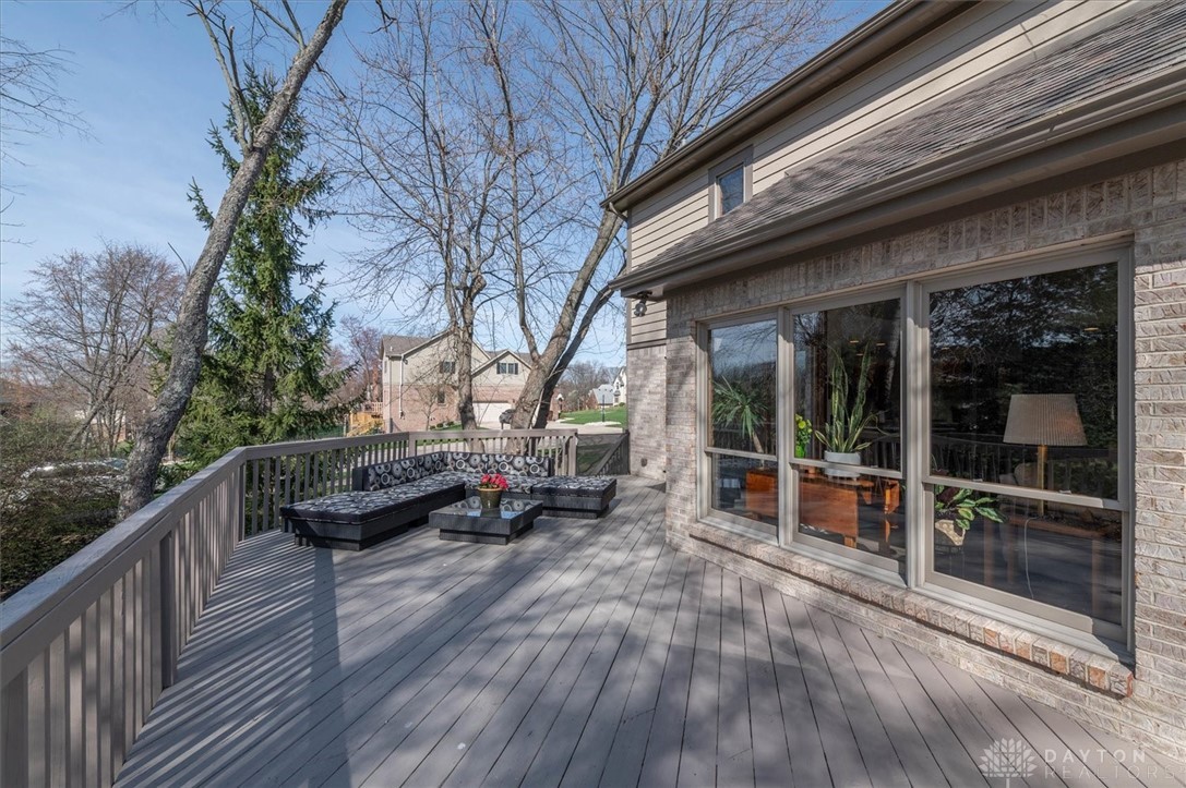 367 Timberleaf Drive Beavercreek, OH 45430 - Photo 3 of 72 What an amazing outdoor space with this sprawling 50' deck with access from living and primary bedroom