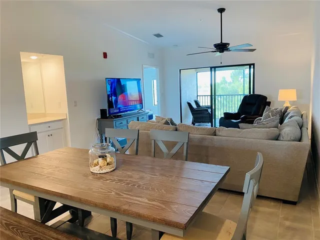 a view of a dining room with furniture