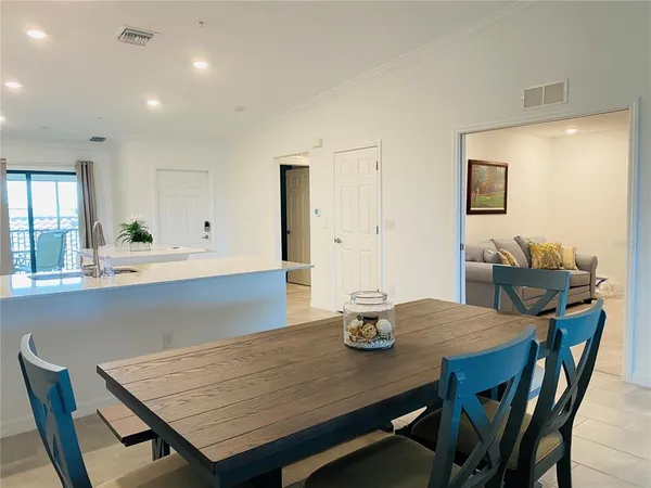a view of a dining room with furniture
