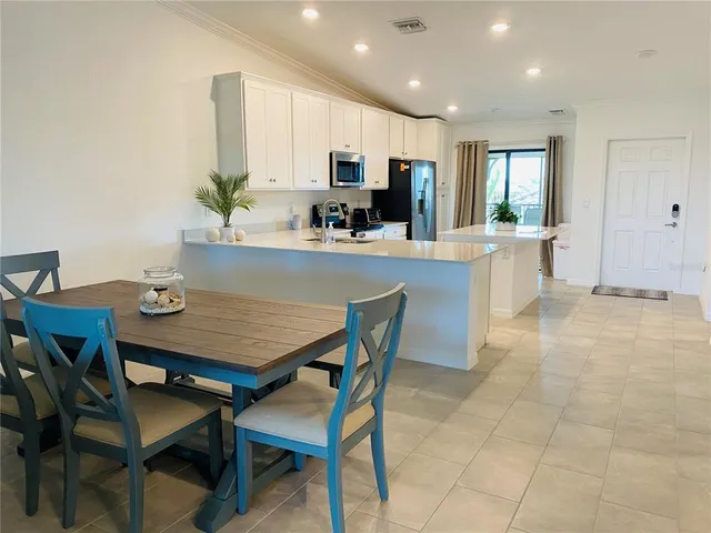 a view of a dining room with furniture