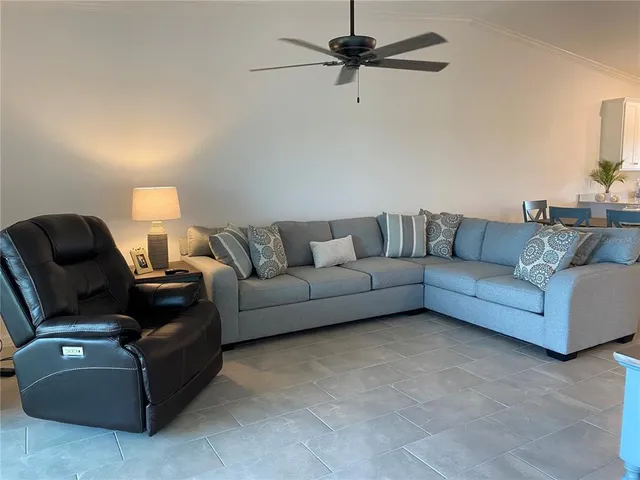 a living room with furniture and a view