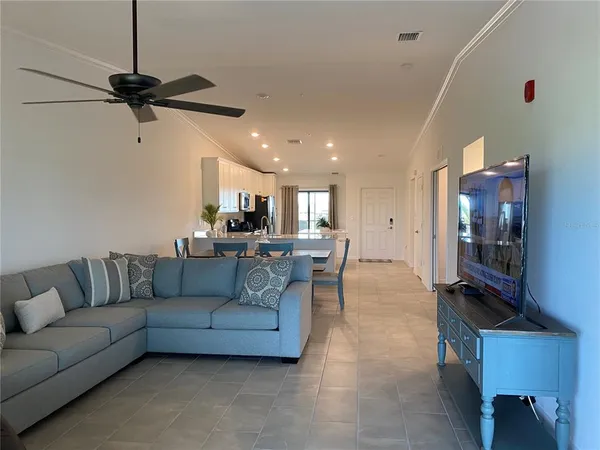 a living room with furniture and a window