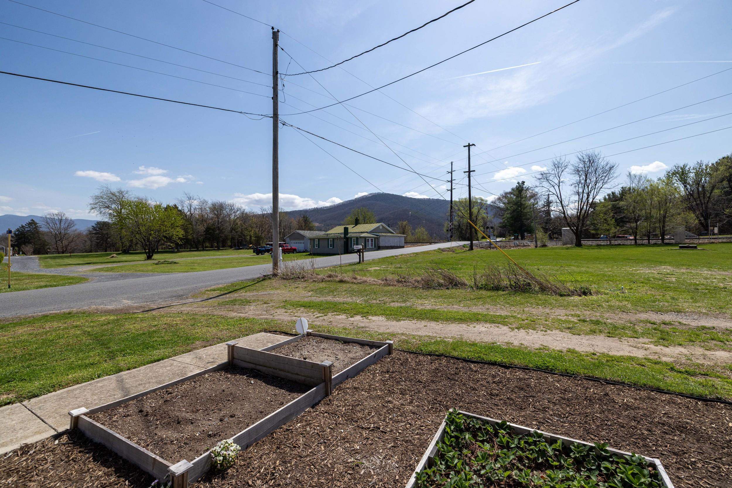 296 Keystone Road Stanley, VA 22851 - Photo 50 of 54 a view of a house with a yard