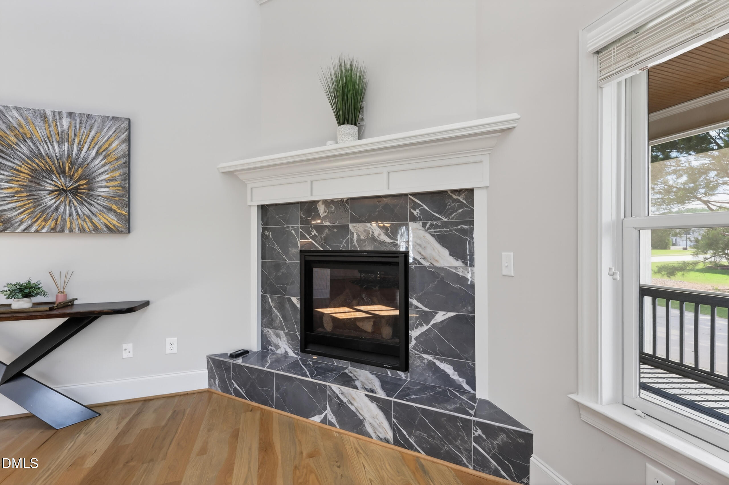 261 Character Drive Rolesville, NC 27571 - Photo 16 of 77 a living room with furniture and a fireplace