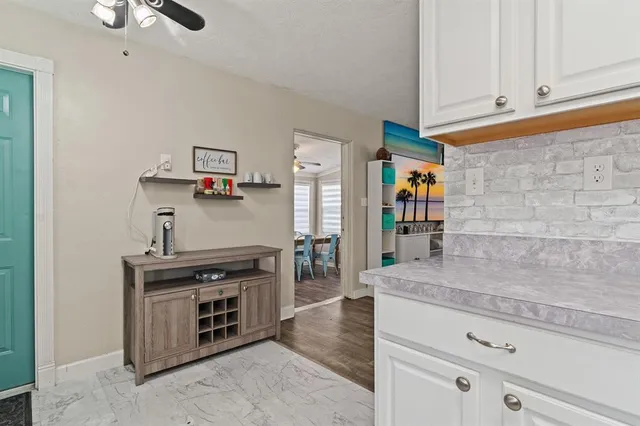 a kitchen with stainless steel appliances granite countertop a stove and a sink