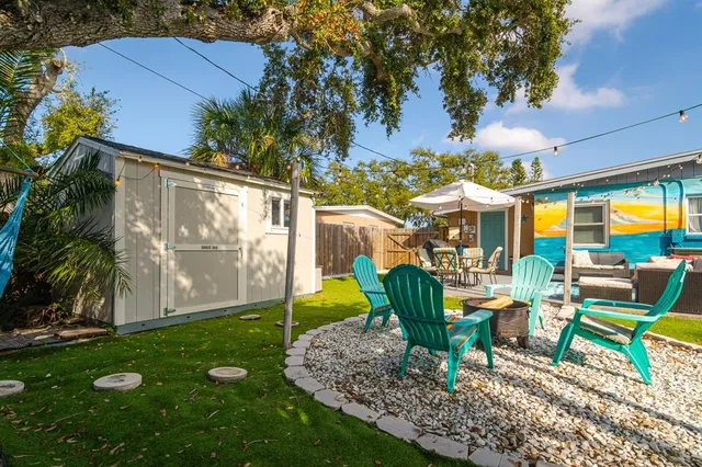 a sign that is on the wooden fence