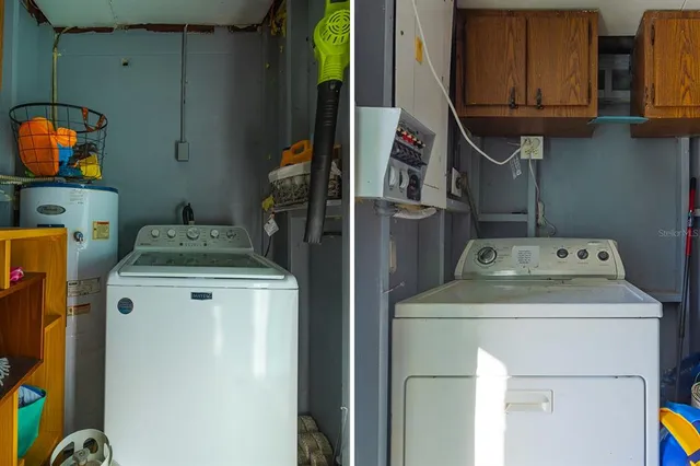 a front view of house with yard and trees around