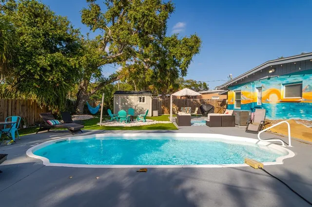 a view of outdoor space yard and swimming pool
