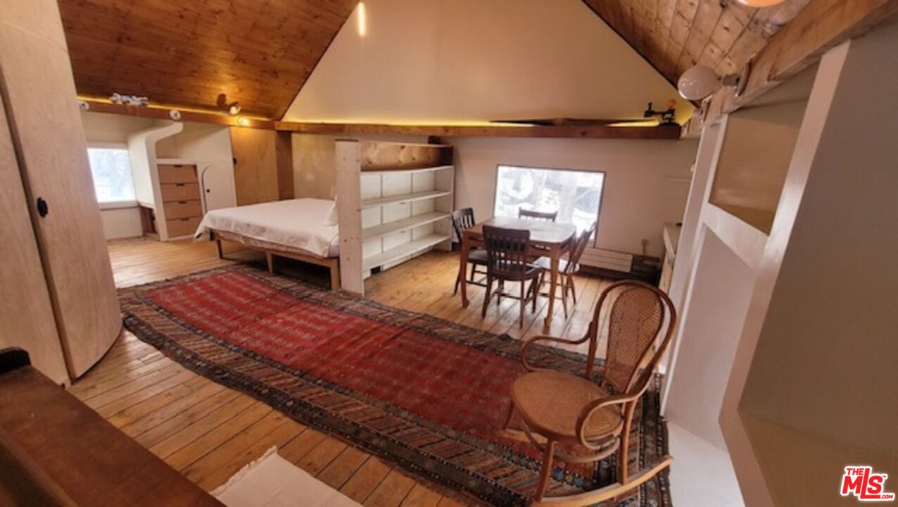 44 Brook Road Warren, VT 05674 - Photo 13 of 19 a living room with furniture and a window