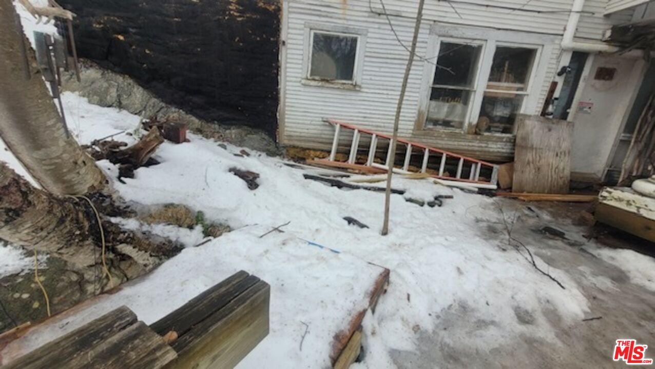 44 Brook Road Warren, VT 05674 - Photo 17 of 19 a view of a house with wooden fence
