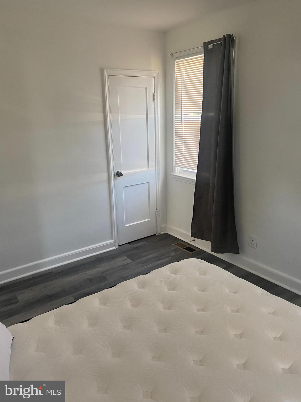 3643 Greenvale Road Baltimore, MD 21229 - Photo 11 of 23 an empty room with windows