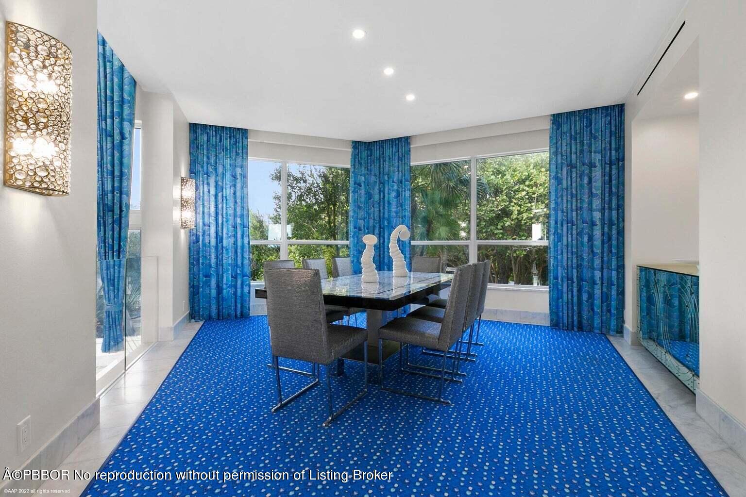 619 South Beach Road Hobe Sound, FL 33455 - Photo 12 of 23 a view of a dining room with furniture window and wooden floor