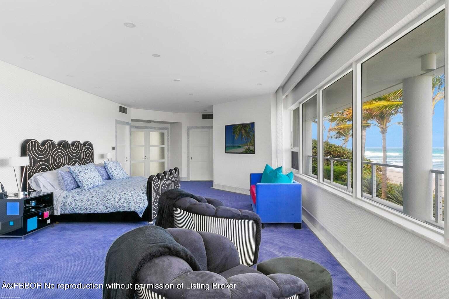 619 South Beach Road Hobe Sound, FL 33455 - Photo 16 of 23 a living room with furniture and a large window