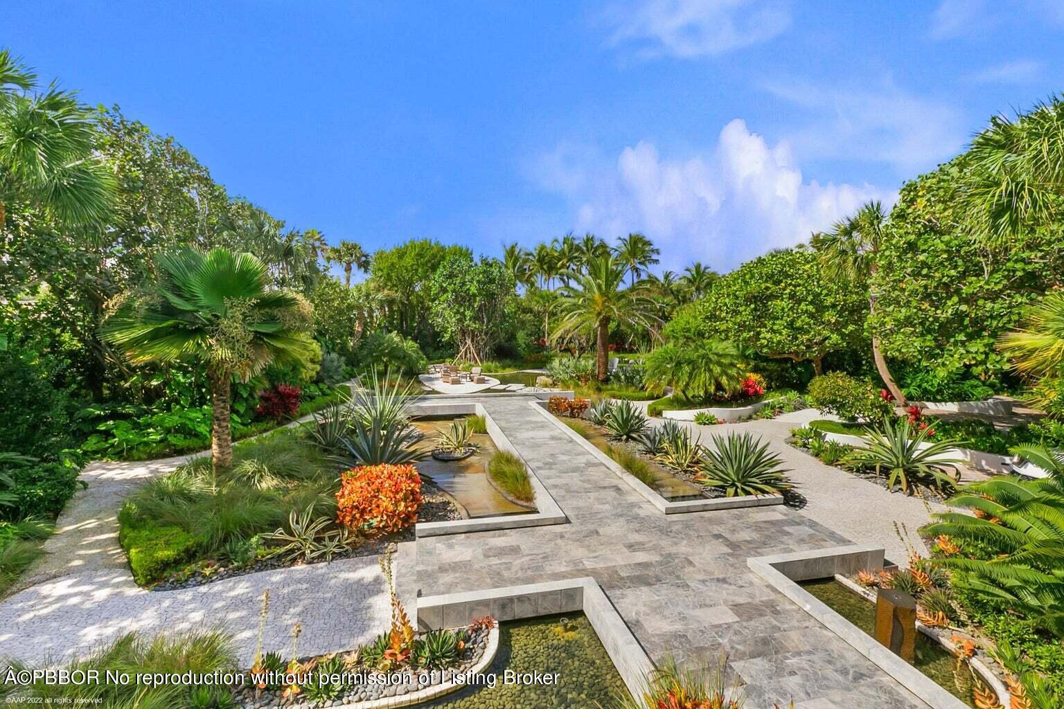 619 South Beach Road Hobe Sound, FL 33455 - Photo 21 of 23 a view of a swimming pool with a patio