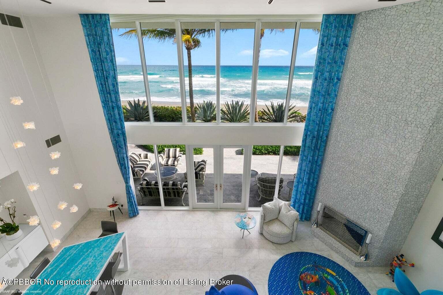 619 South Beach Road Hobe Sound, FL 33455 - Photo 7 of 23 a room with furniture and a large window