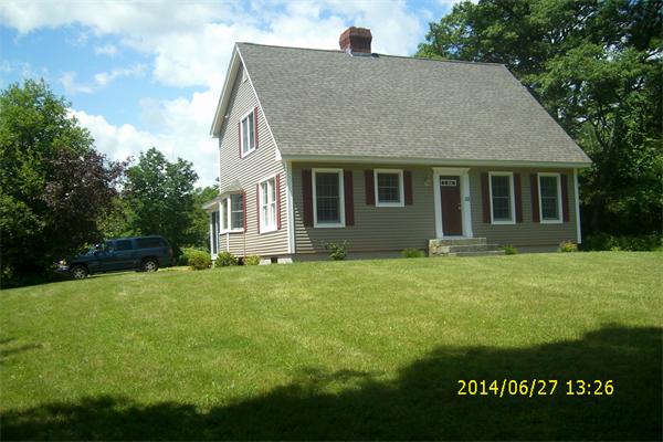 a view of a house with a garden