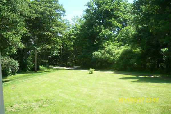 55 Ridge Road Rutland, MA 01543 - Photo 17 of 24 a view of swimming pool with a yard