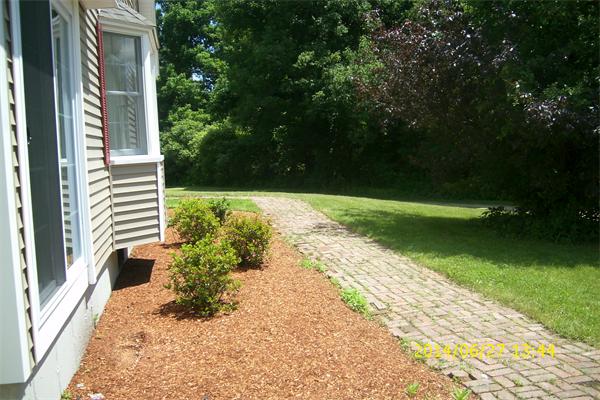 55 Ridge Road Rutland, MA 01543 - Photo 21 of 24 a view of a backyard with pathway