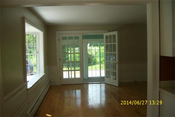 55 Ridge Road Rutland, MA 01543 - Photo 6 of 24 a view of an empty room with wooden floor and a window