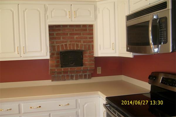 55 Ridge Road Rutland, MA 01543 - Photo 7 of 24 a kitchen with granite countertop a sink and a stove