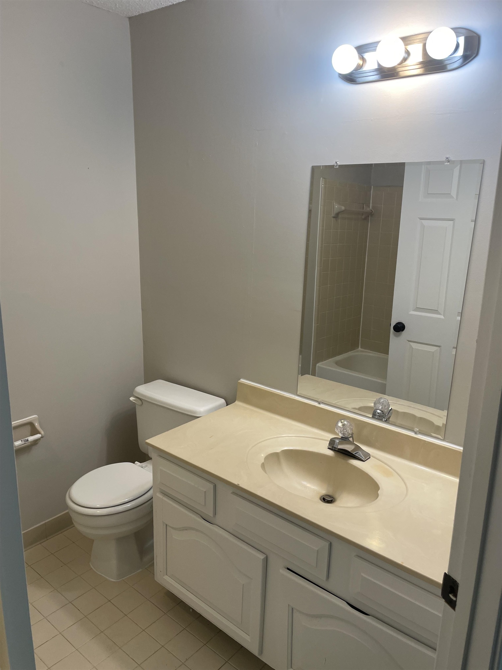 242 South Walnut Bend Road Memphis, TN 38018 - Photo 15 of 17 Bathroom featuring tile patterned flooring, vanity, and toilet