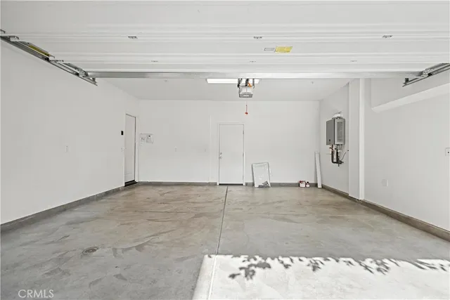 a view of a palm trees front of house